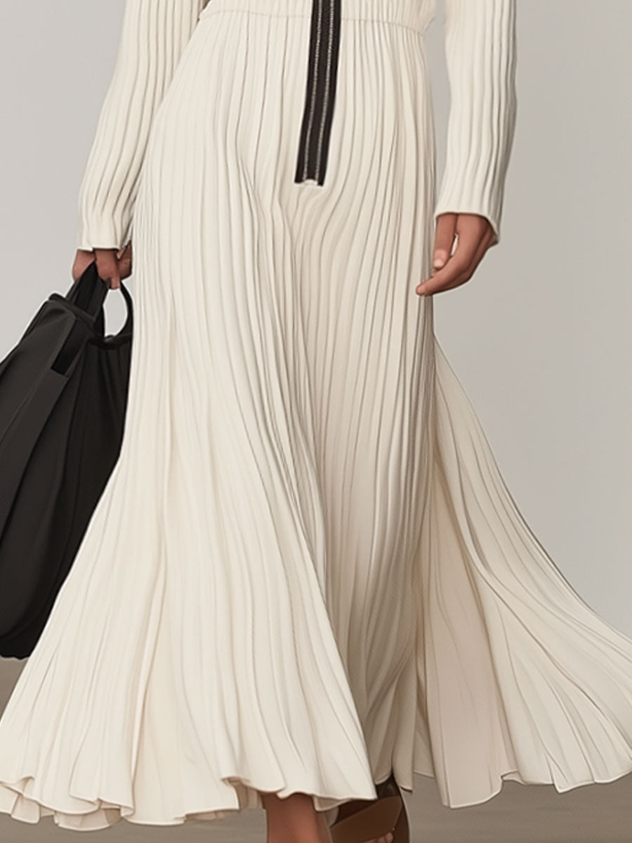Vestido largo informal de punto blanco con solapa y manga larga, moderno y elegante.